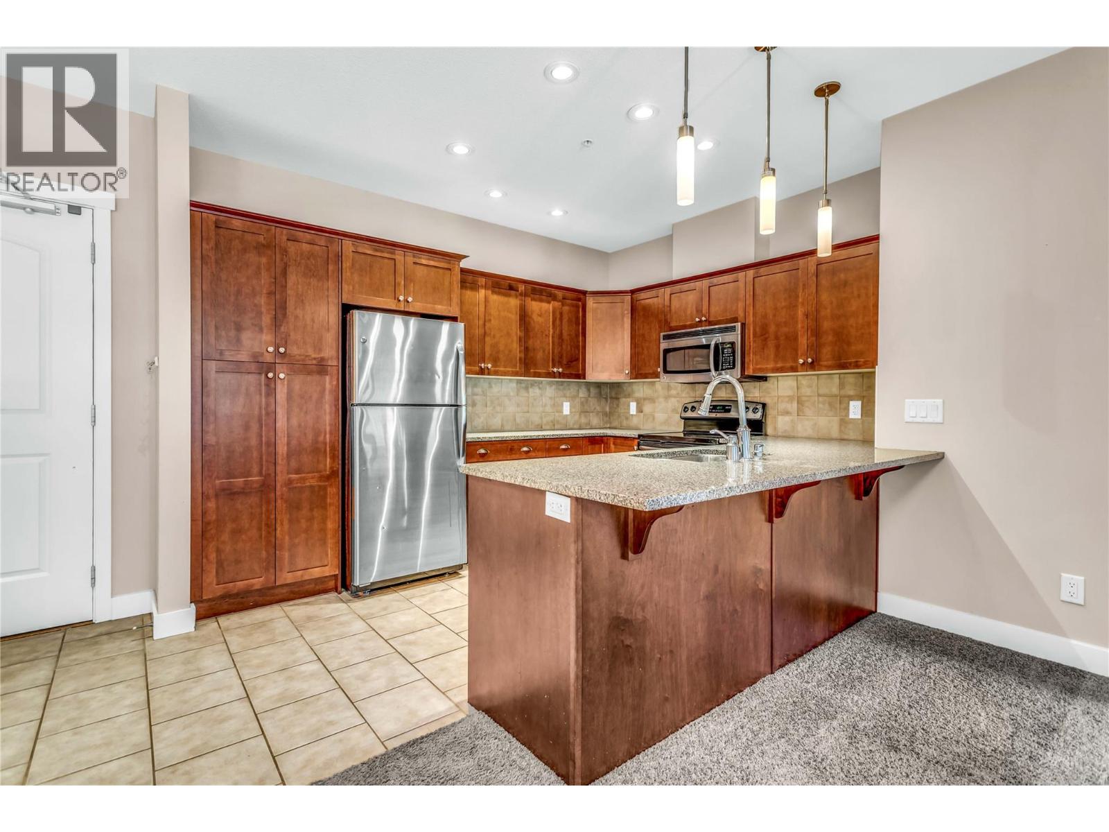 Picture for Unit #3215, 1990 Upper Sundance  Drive https://www.cirrealty.ca/reb/bc/8/10365048_2.jpg