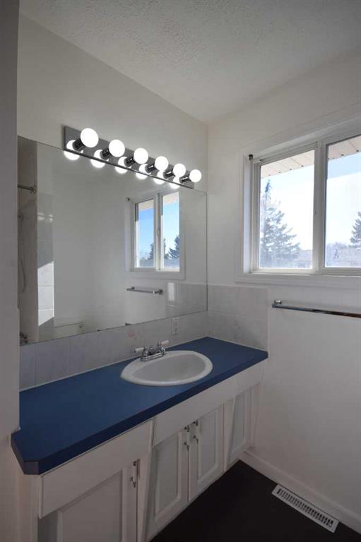 Picture for 111, 5823 57 Street  https://www.cirrealty.ca/reb/cara/3/A2265123_15.jpg