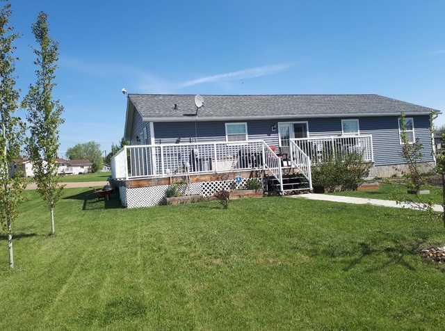 Picture for 5015 45 Street  https://www.cirrealty.ca/reb/cara/5/A2261725_37.jpg