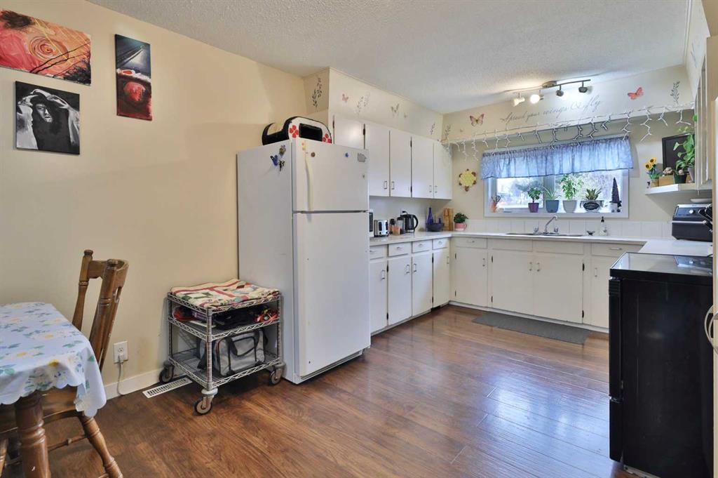Picture for 5611 53 Avenue  https://www.cirrealty.ca/reb/cara/8/A2266378_9.jpg