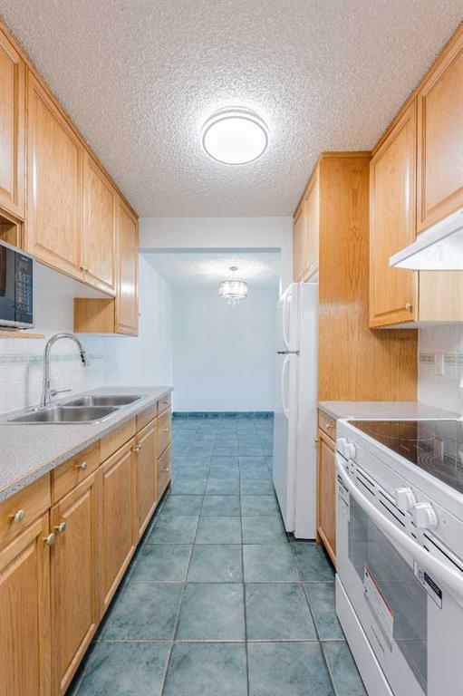 Picture for 303, 635 56 Avenue SW