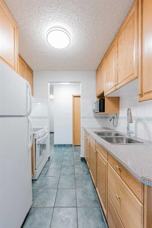 Picture for 303, 635 56 Avenue SW