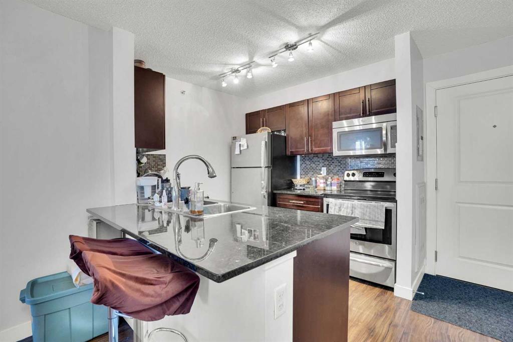 Picture for 411, 15 Saddlestone Way NE