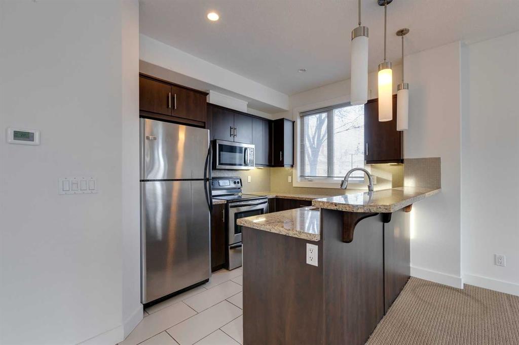 Picture for 101, 320 12 Avenue NE