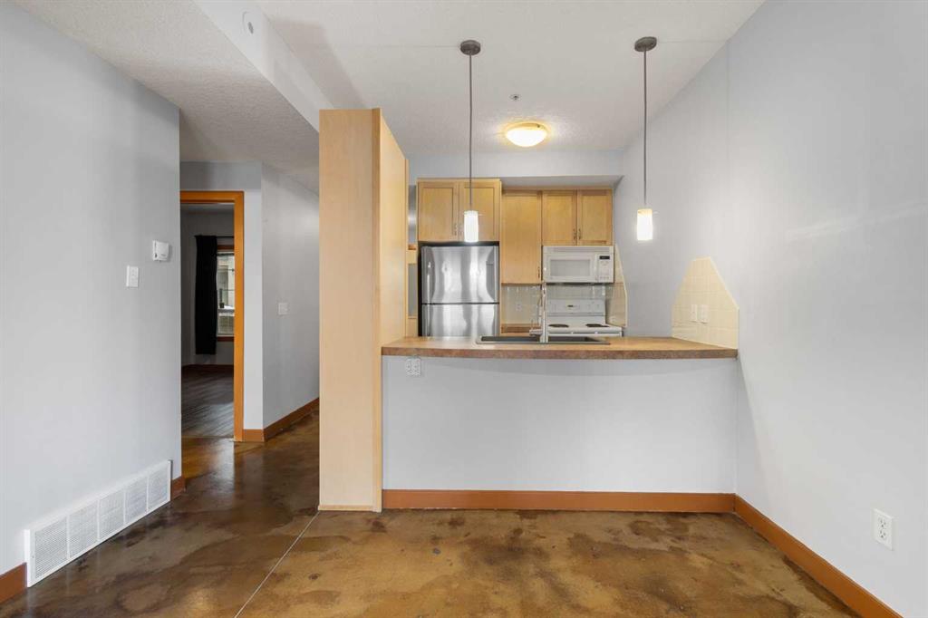 Picture for 110, 1235 13 Avenue SW