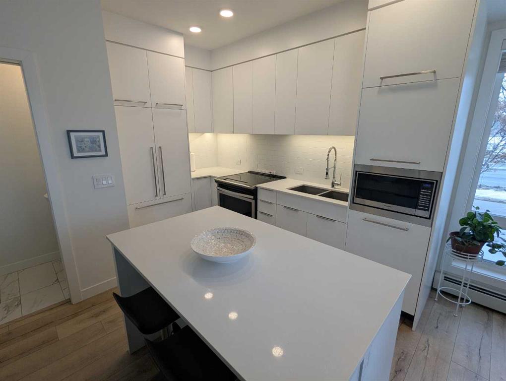 Picture for 102, 3125 39 Street NW