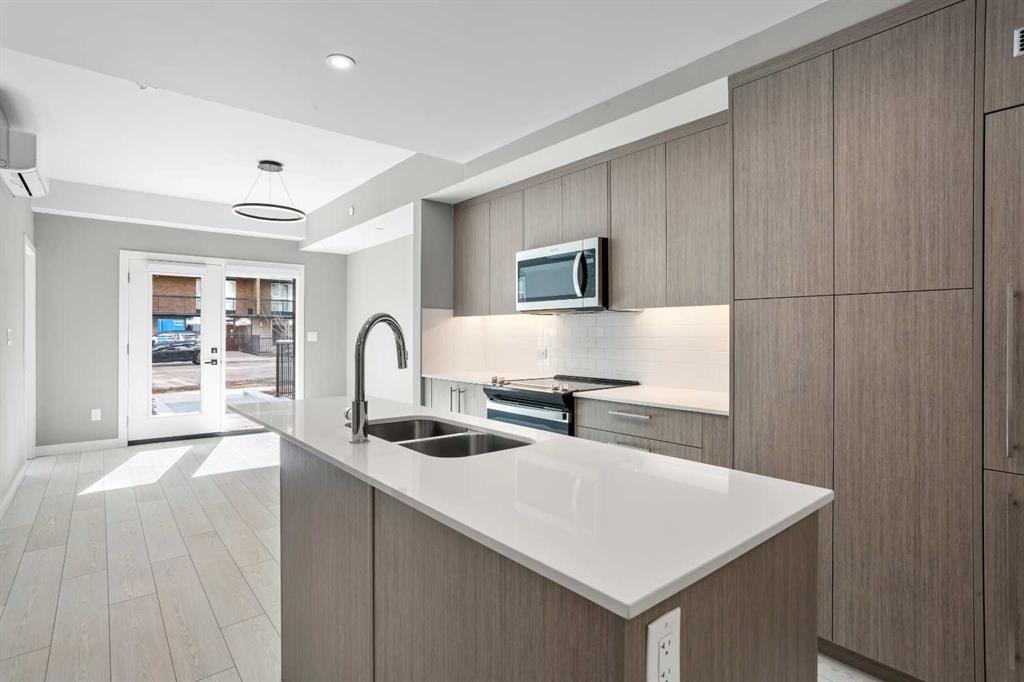 Picture for 111, 310 15 Avenue SW