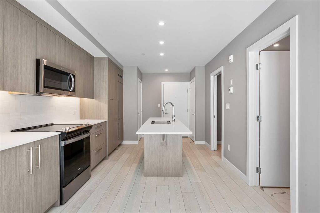 Picture for 111, 310 15 Avenue SW