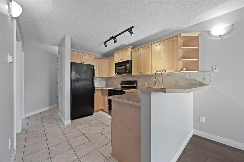 Picture for 305, 60 38A Avenue SW https://www.cirrealty.ca/reb/creb/30/A2266030_11.jpg