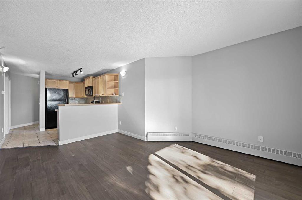 Picture for 305, 60 38A Avenue SW https://www.cirrealty.ca/reb/creb/30/A2266030_14.jpg