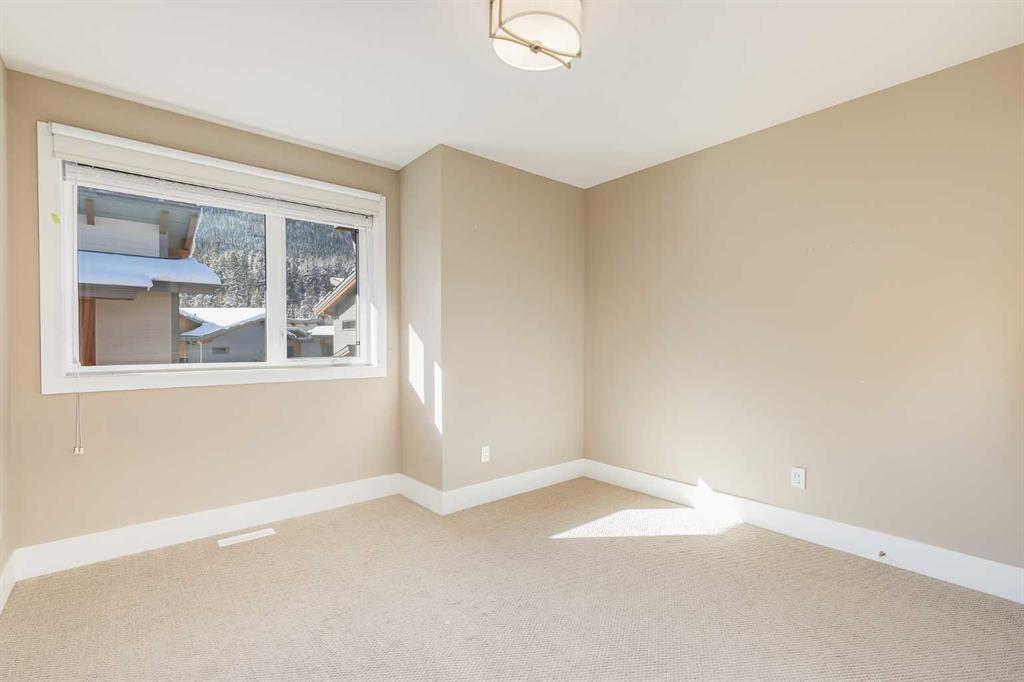 Picture for 104A, 1101 Three Sisters Parkway  https://www.cirrealty.ca/reb/creb/42/A2265242_24.jpg