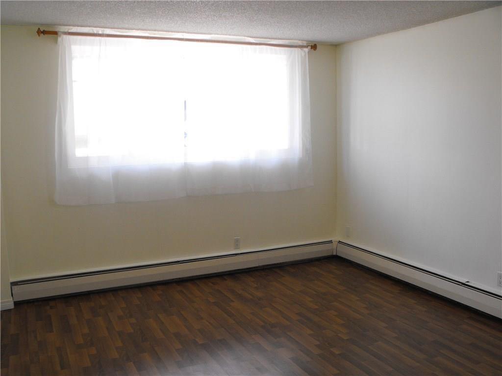 Picture for 104, 1143 37 Street SW