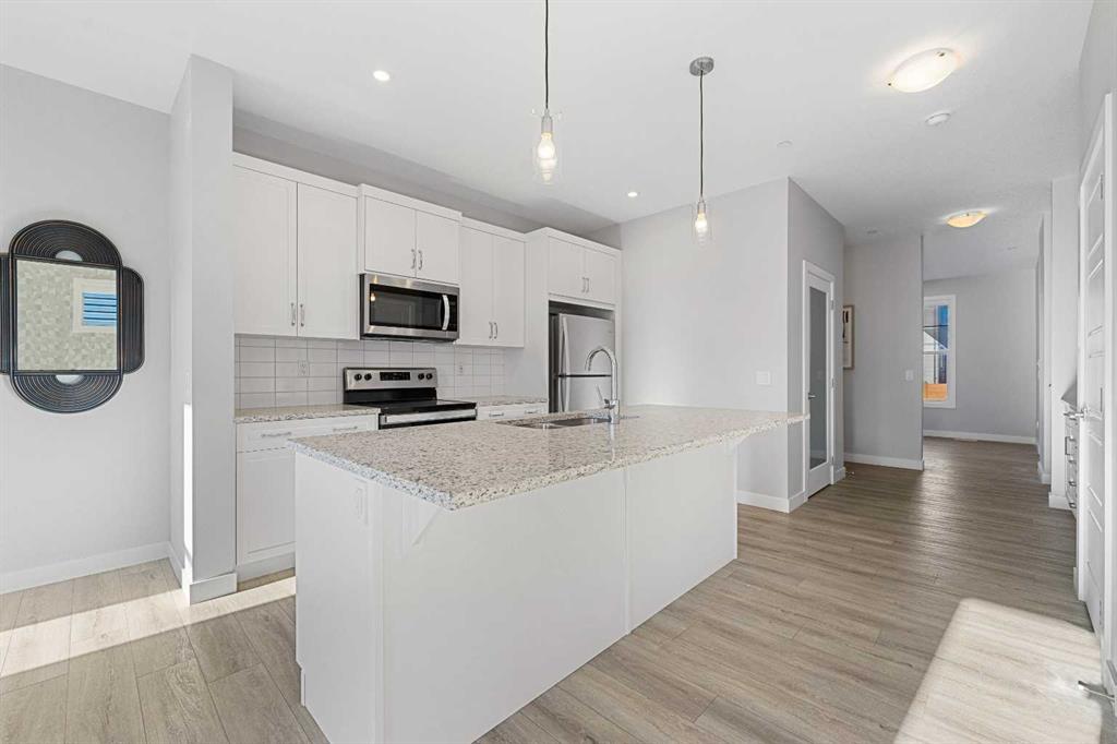Picture for 129 Hotchkiss Way SE https://www.cirrealty.ca/reb/creb/44/A2263344_21.jpg