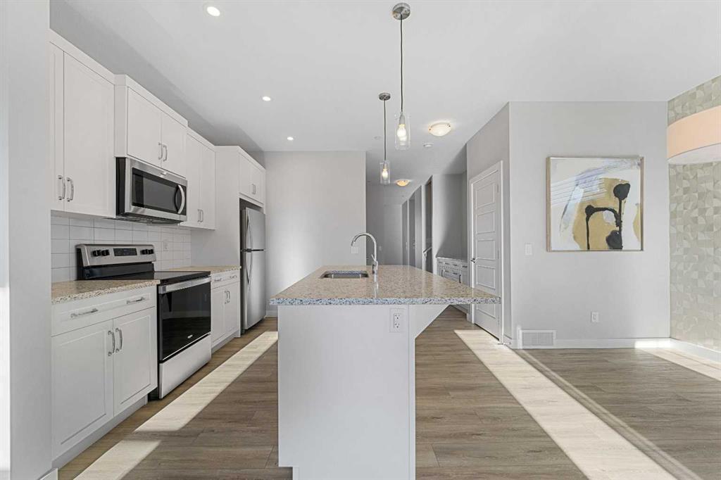 Picture for 129 Hotchkiss Way SE https://www.cirrealty.ca/reb/creb/44/A2263344_24.jpg