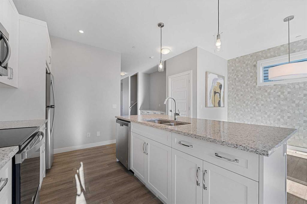 Picture for 129 Hotchkiss Way SE https://www.cirrealty.ca/reb/creb/44/A2263344_26.jpg