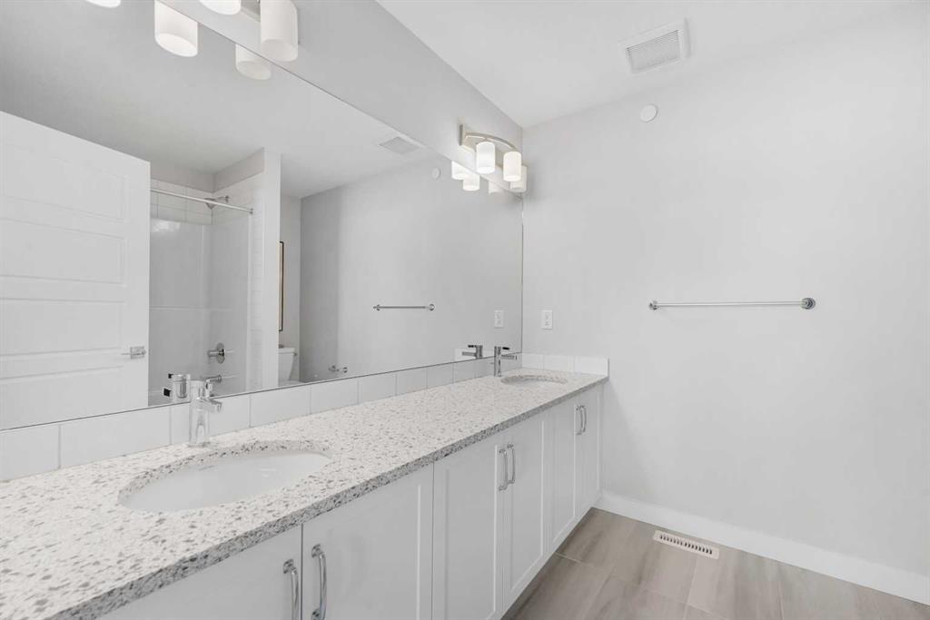 Picture for 129 Hotchkiss Way SE https://www.cirrealty.ca/reb/creb/44/A2263344_39.jpg