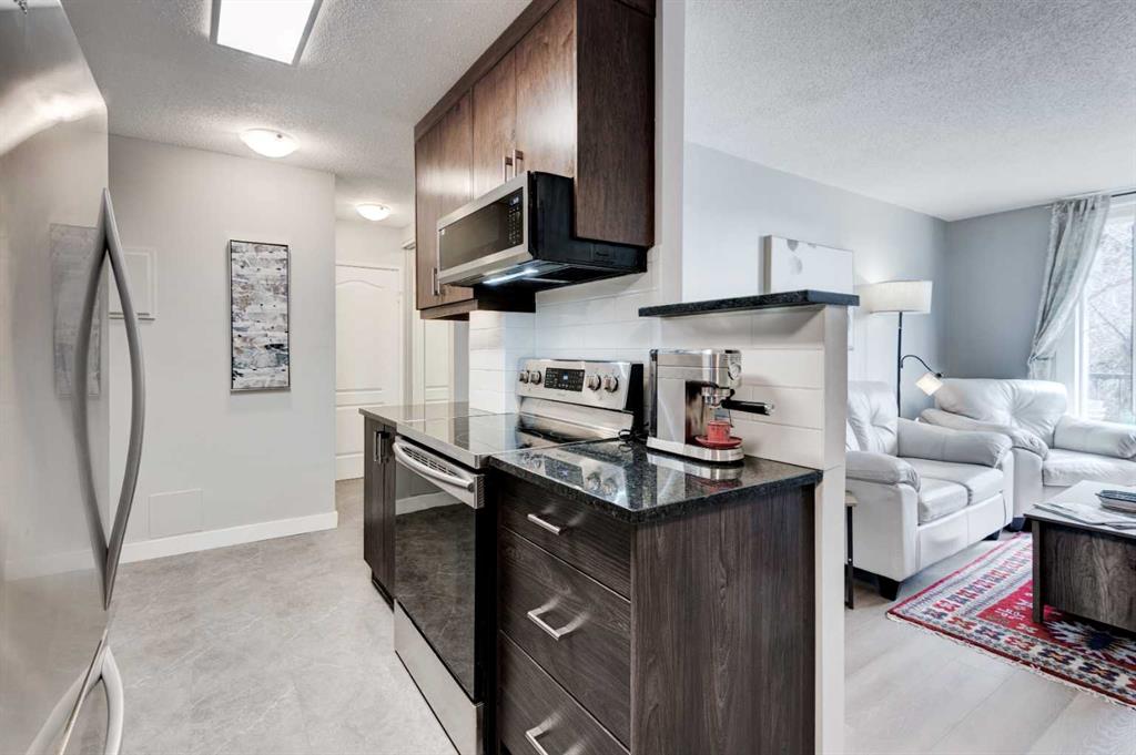 Picture for 303, 1328 13 Avenue SW