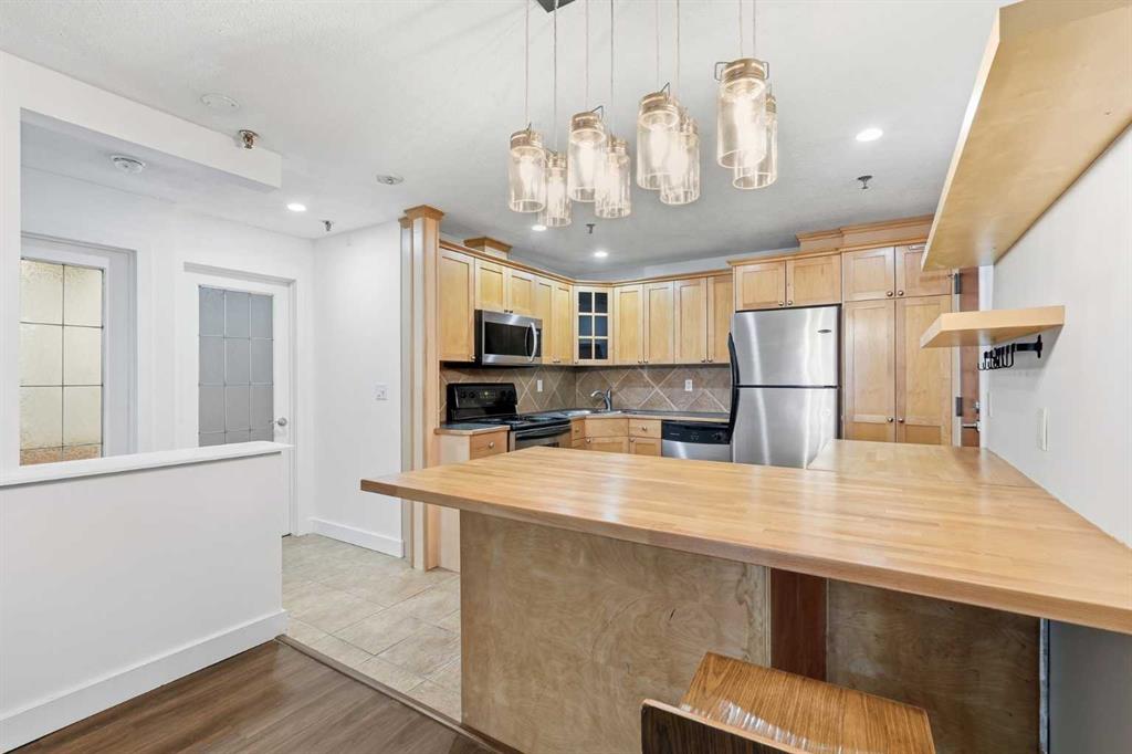 Picture for 107, 717 4A Street NE