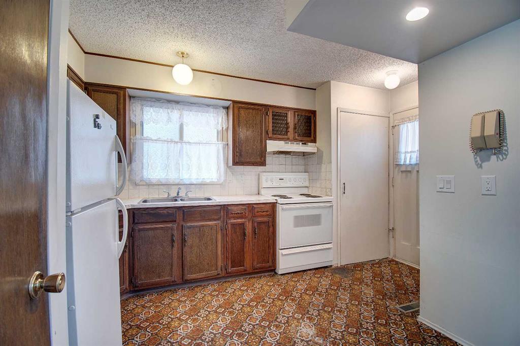 Picture for 4108 13 Avenue NE https://www.cirrealty.ca/reb/creb/84/A2266084_11.jpg