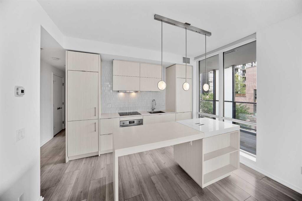 Picture for 210, 615 6 Avenue SE https://www.cirrealty.ca/reb/creb/92/A2266592_8.jpg