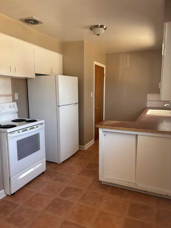 Picture for 1, 1131 28A Street S