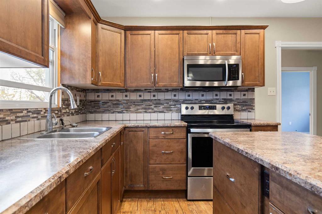 Picture for 417 2 Street SE https://www.cirrealty.ca/reb/mhreb/9/A2265349_10.jpg