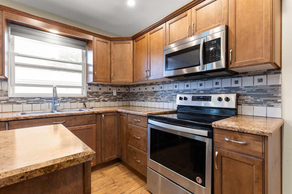 Picture for 417 2 Street SE https://www.cirrealty.ca/reb/mhreb/9/A2265349_13.jpg